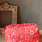 handmade red floral toilerty bag