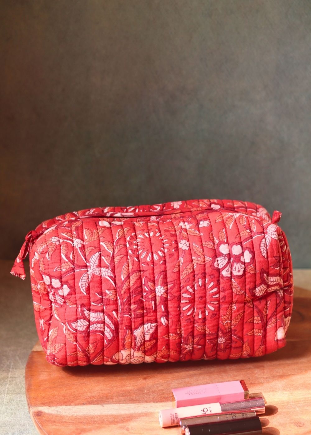 red floral toiletry bag made by cotton