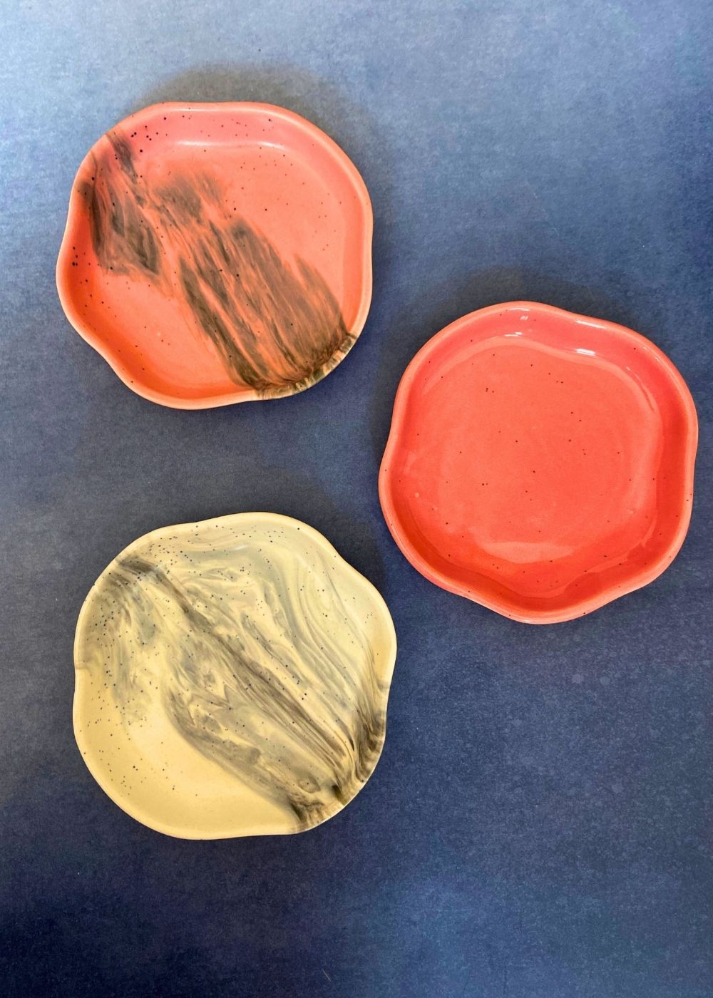 set of three dessert plates made by ceramic 