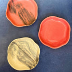 set of three dessert plates made by ceramic 