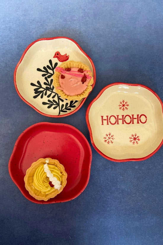 set of three dessert plates made by ceramic