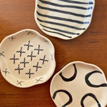 set of three dessert plates made by ceramic