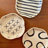 set of three dessert plates made by ceramic