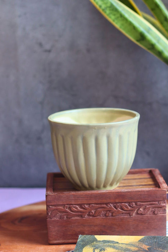 army green planter made by ceramic 