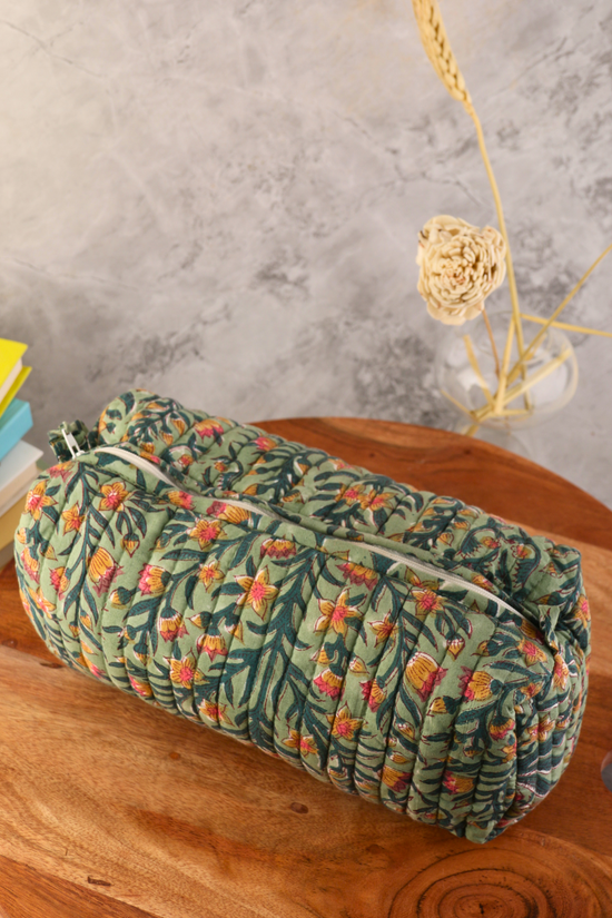 Toiletry bag on wooden surface