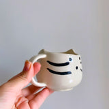 kitty mug made by ceramic 