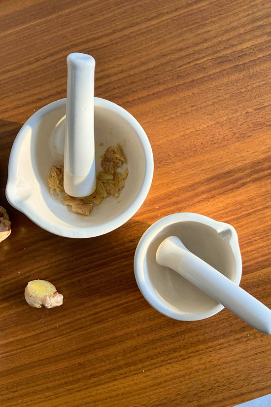 white mortar & pestle made by ceramic