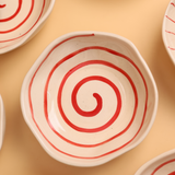 ceramic red spiral bowl with red & white color