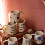 handmade quoted mugs