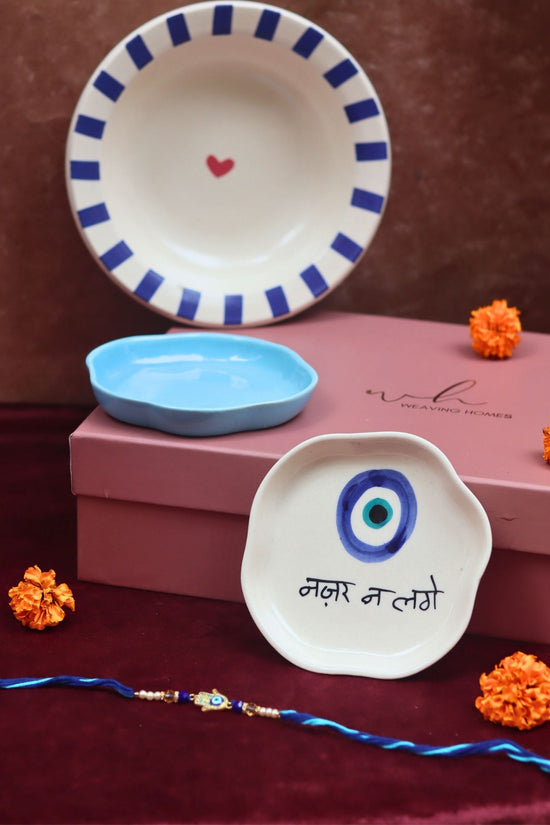 The Evil eye Luxe Rakhi Gift Hamper made by ceramic