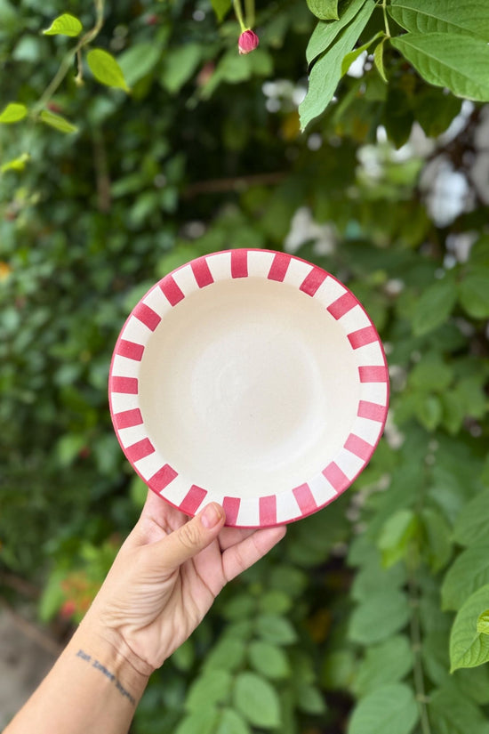 Red striped pasta plate made by ceramic