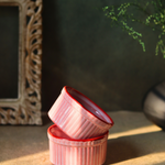 Two solid pink ceramic ramekins 