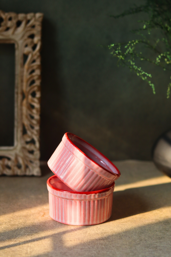 Two solid pink ceramic ramekins 