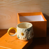 daisy bloom mug made by ceramic