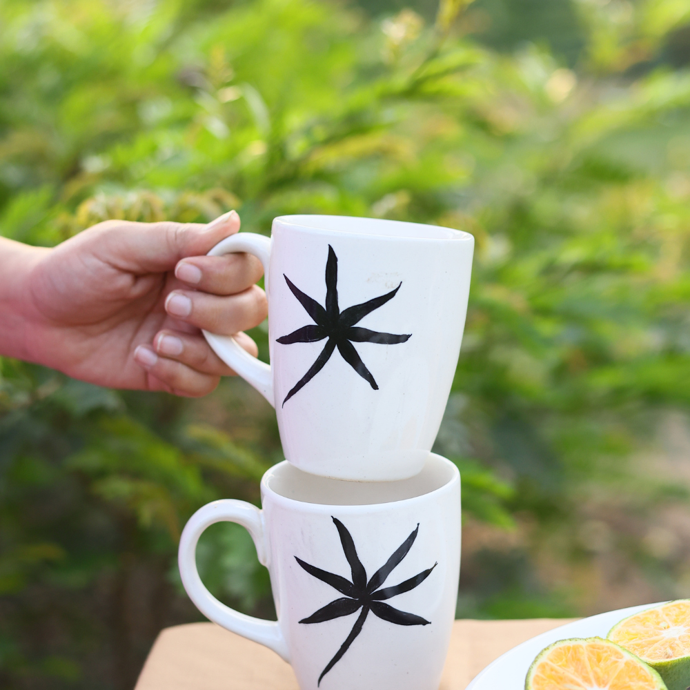 White & black ceramic coffee mugs