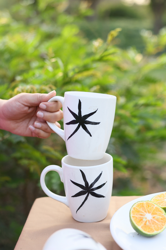 White & black ceramic coffee mugs