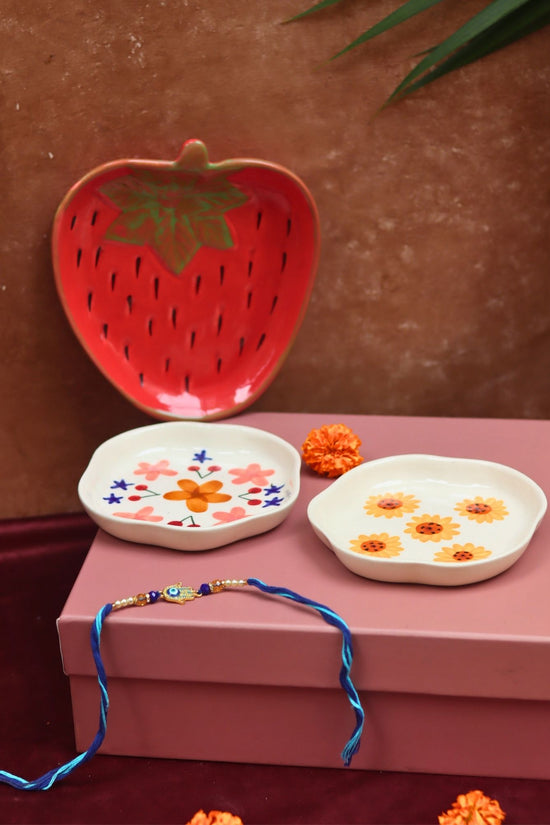 The Blissful Bloom Luxe Rakhi Gift Hamper made by ceramic