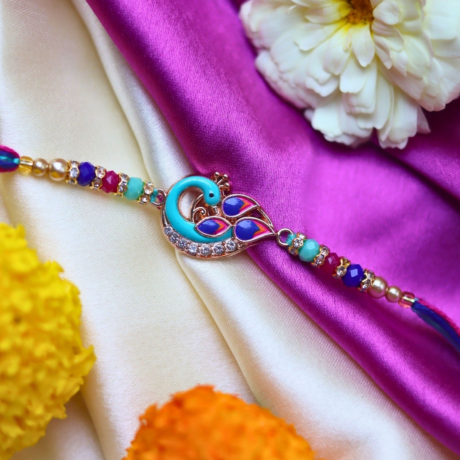 Peacock Rakhi made with premium quality materal