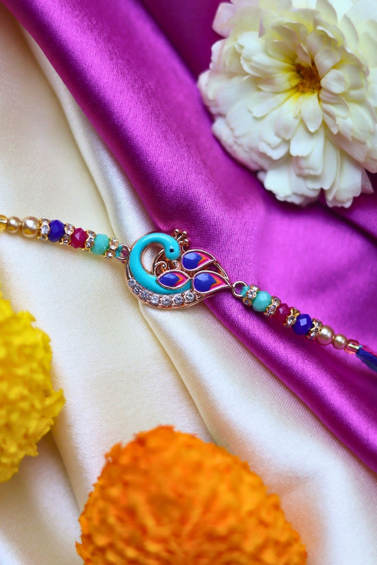 Peacock Rakhi made with premium quality materal
