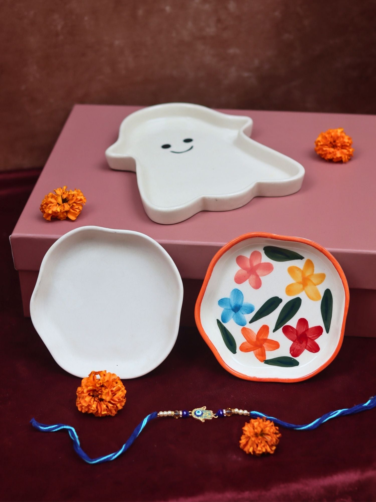The Little Joys Luxe Rakhi Gift Hamper mde by ceramic