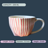handmade red lined mug with measurement