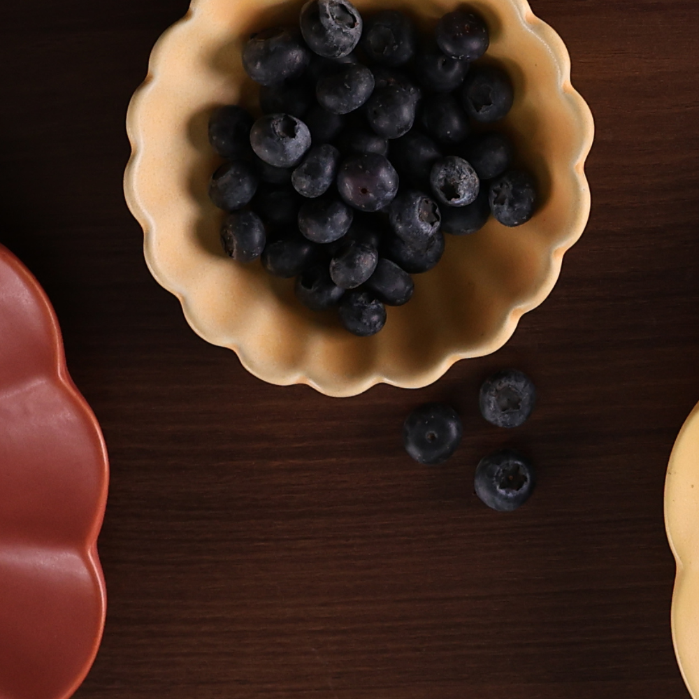 Genda phool bowl with berries