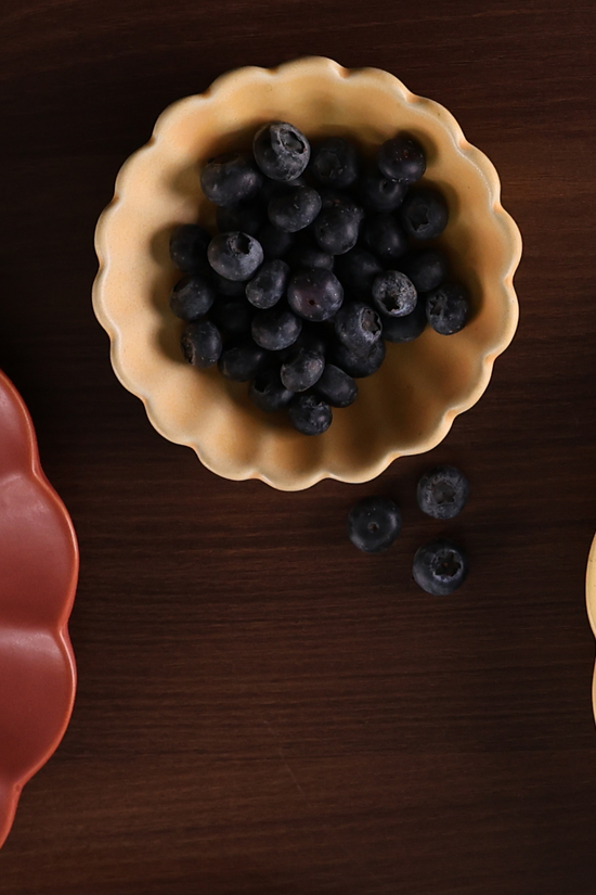 Genda phool bowl with berries
