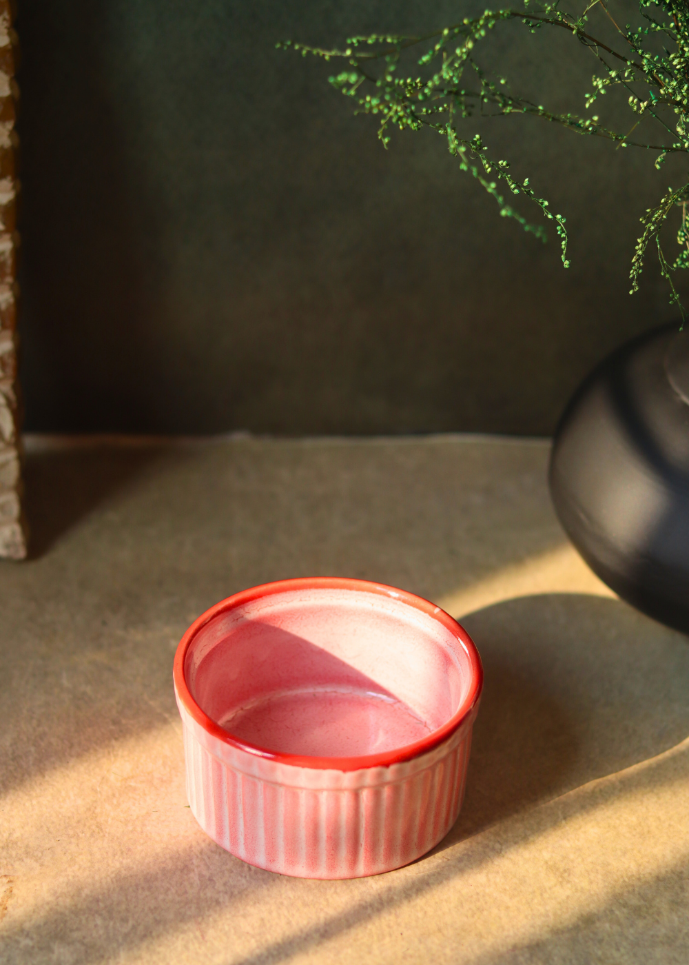 Two ceramic pink kitchenware ramekins