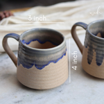 Brown and blue drip coffee mug height & breadth 