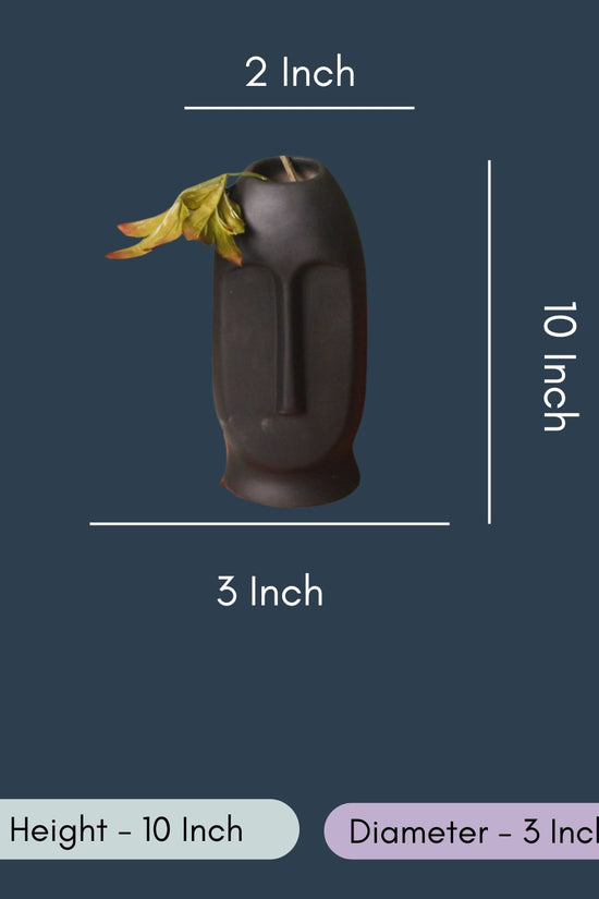 Black Face Vase