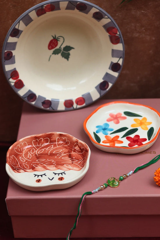 The Cherry Bliss Luxe Rakhi Gift Hamper made by ceramic