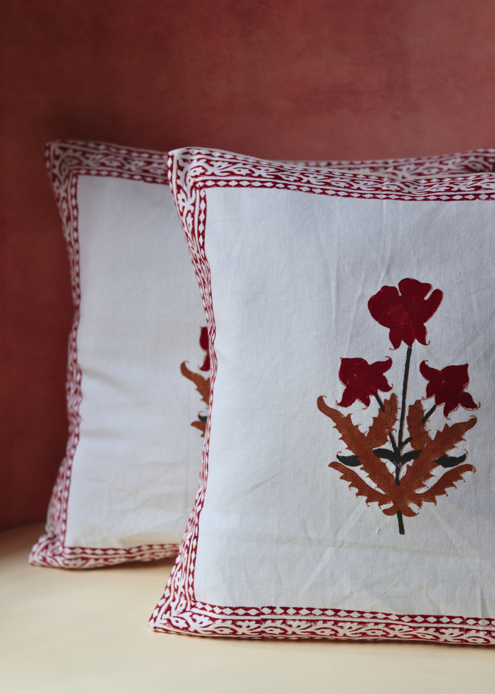 Maroon floral cushion covers 