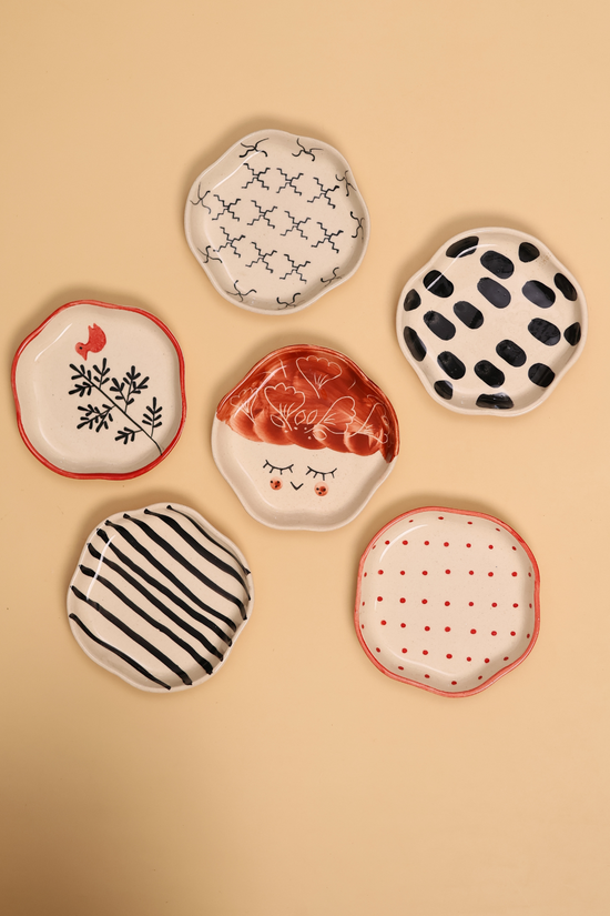 red & black handmade dessert plate made by ceramic 
