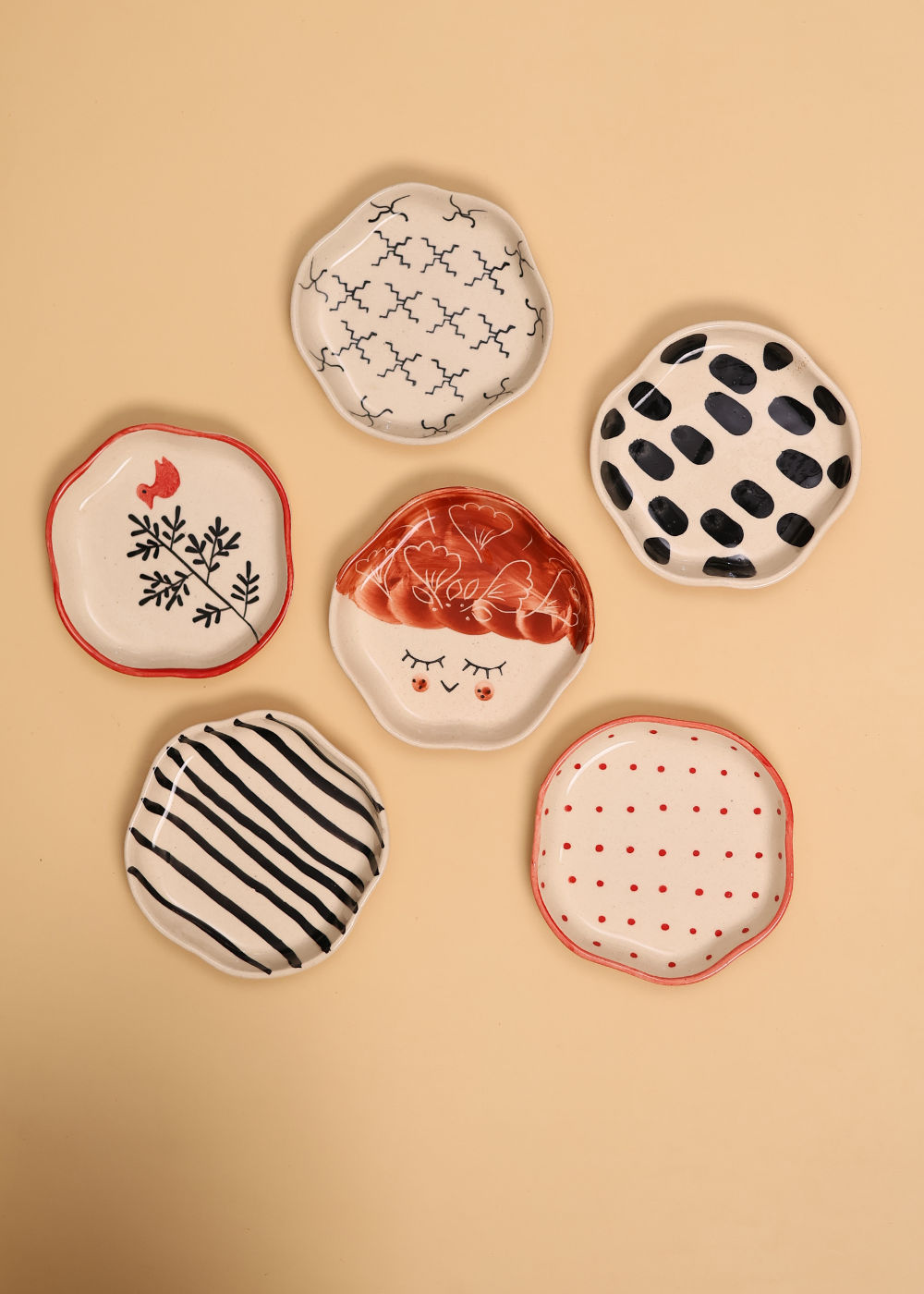 red & black handmade dessert plate made by ceramic 
