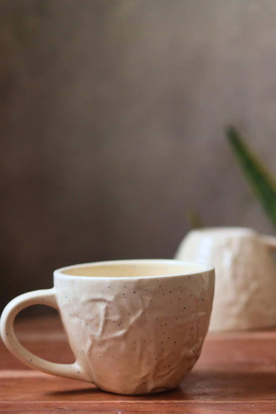 cream textured mug with unique design