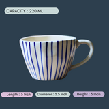 handmade blue lined mug with measurement