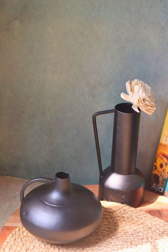 black handle & tall vases made by metal
