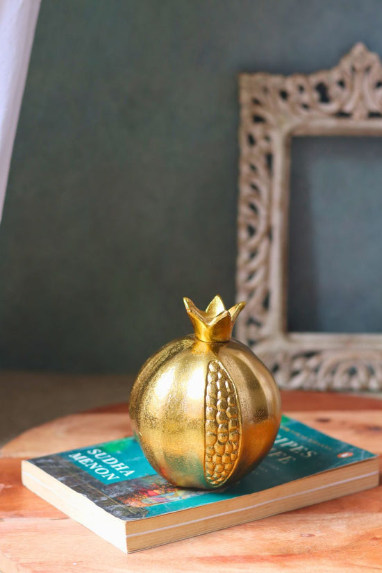 golden anar made by metal