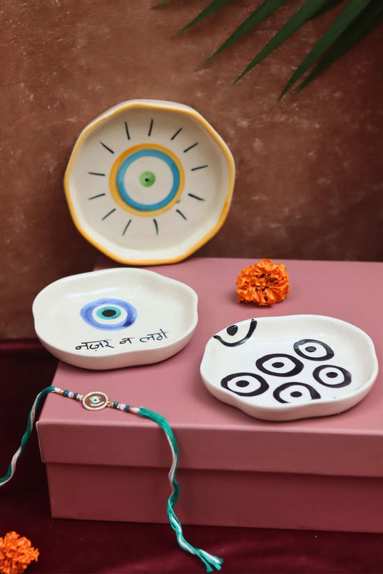 The Nazar Charm Luxe Rakhi Gift Hamper made by ceramic
