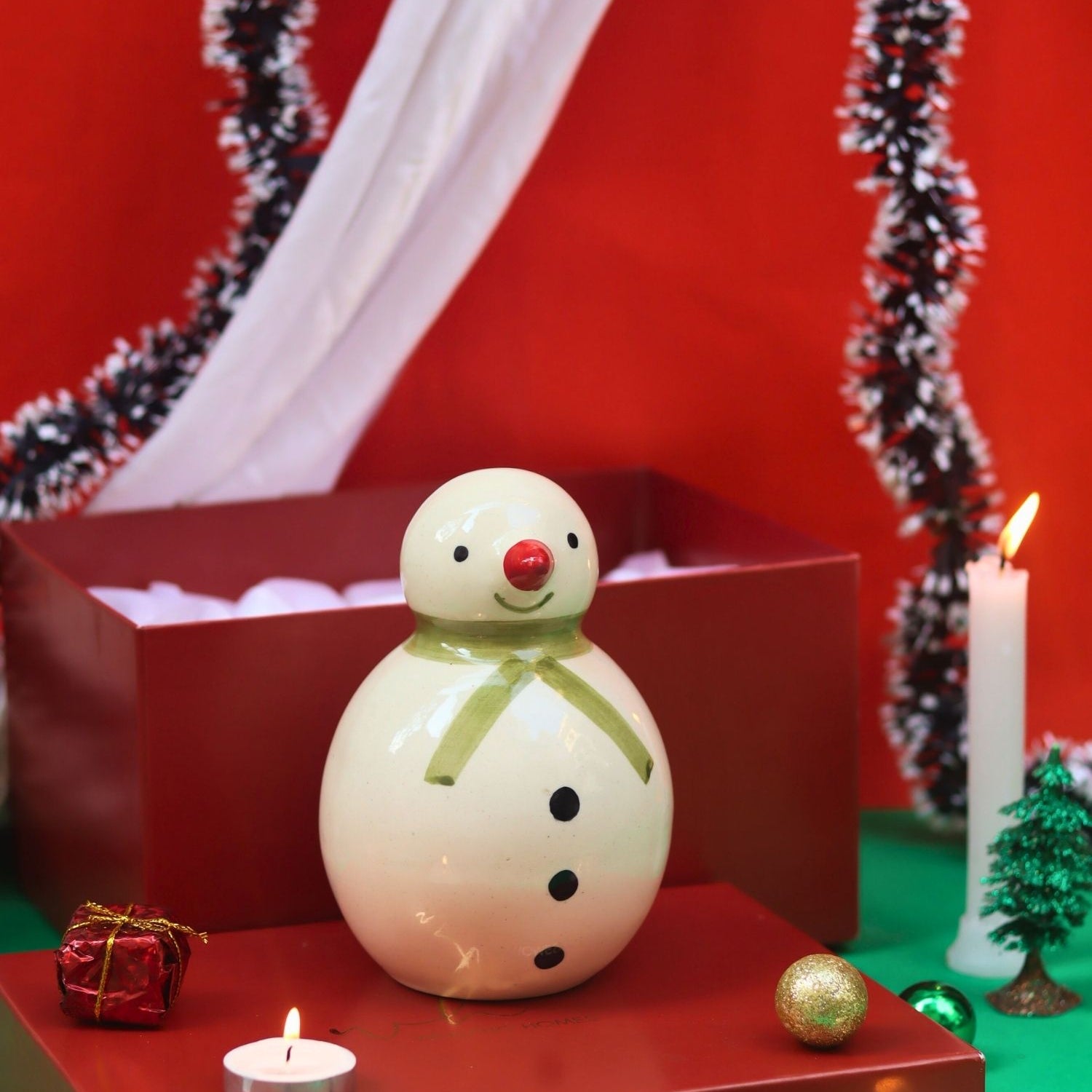 The Christmas Snowman in a Gift Box made by ceramic