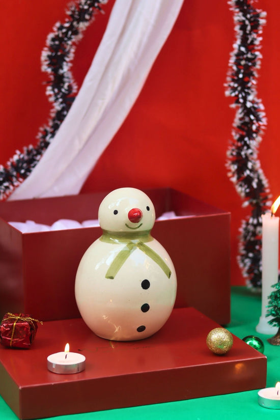 The Christmas Snowman in a Gift Box made by ceramic