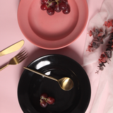 handmade pink & black pasta plate with golden cutlery