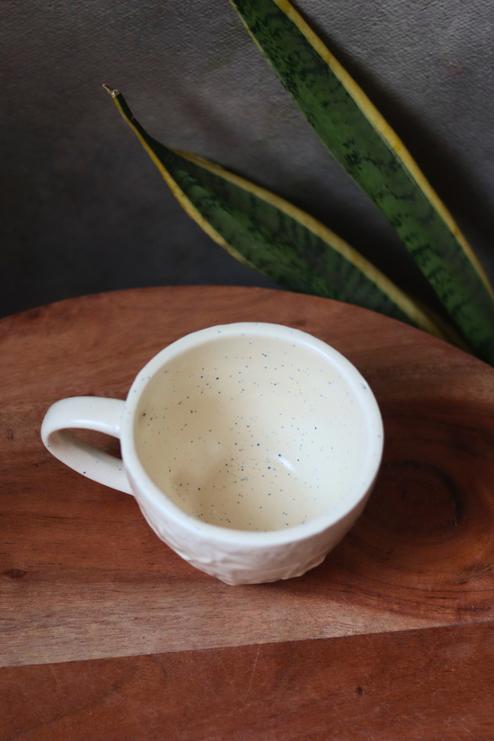 cream textured mug made by ceramic 