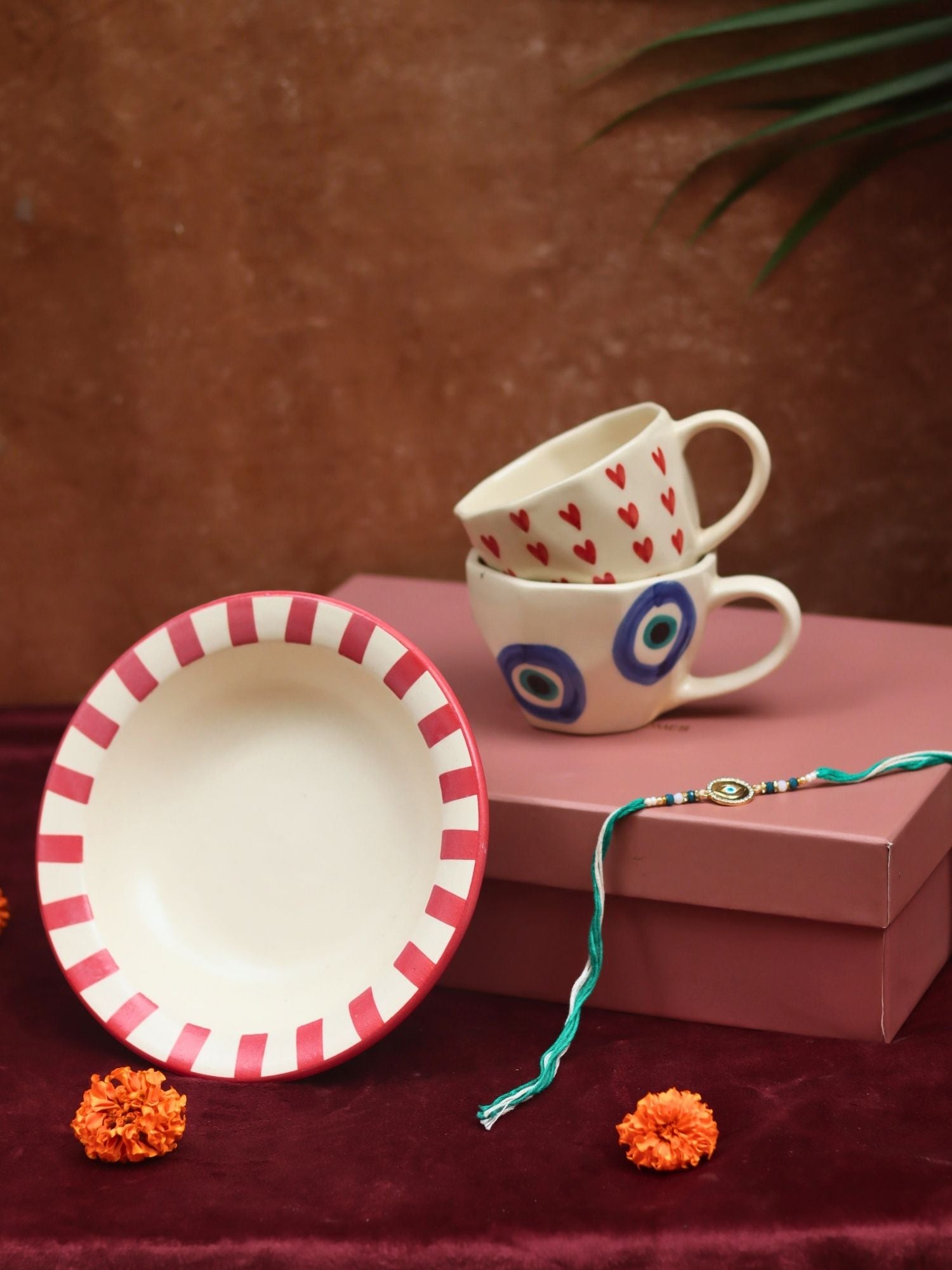 The Heartful Delight Luxe Rakhi Gift Hamper made by ceramic
