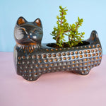 metallic blue cat planter made by ceramic 