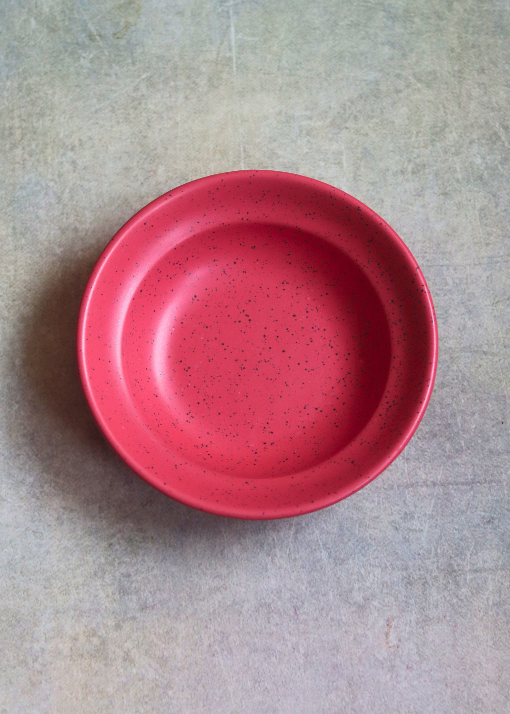 Deep red pasta plate top shot