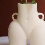 white body vase made by ceramic 
