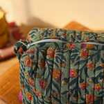 Closeup shot of green toiletry bag