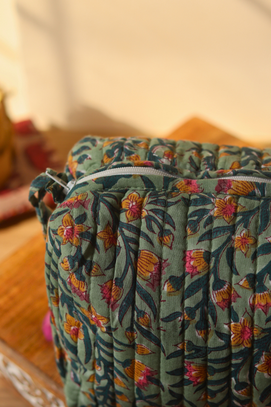 Closeup shot of green toiletry bag