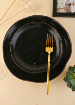 Golden tranquility fork on plate